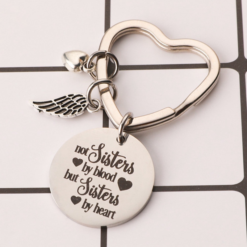 Móc khóa tròn in chữ I 'm Not Sisters By Blood But Sisters By Heart