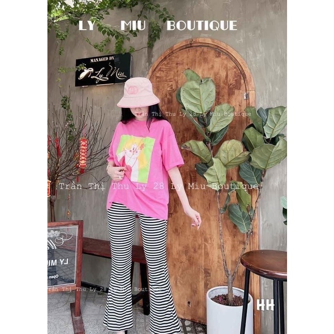 set bộ áo thun form rộng cô gái tóc vàng quần loe dài sọc k