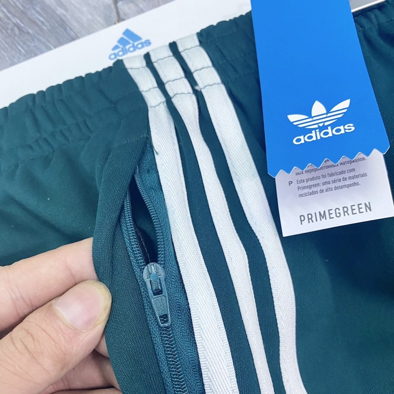 Bộ Quần Áo Thể Thao Unisex Nam Nữ Adidas SST Track - Màu Xanh Rêu