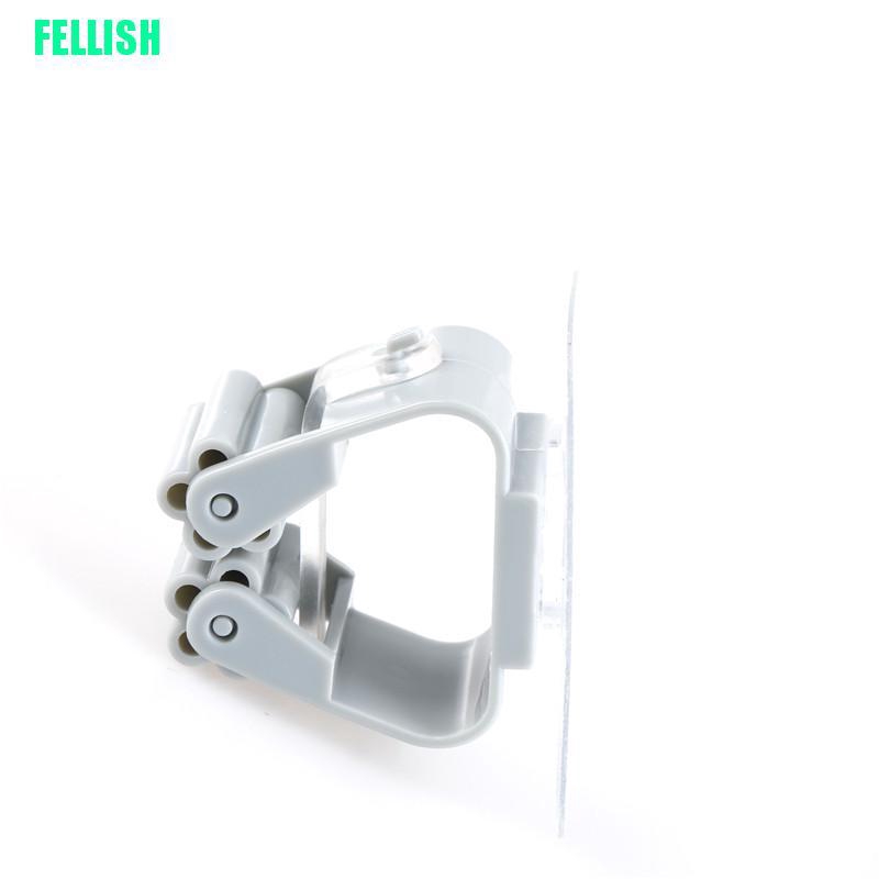 Giá treo cây lau nhà dán tường tiện lợi