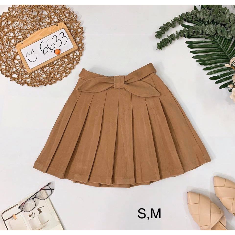 Chân váy xếp ly nơ