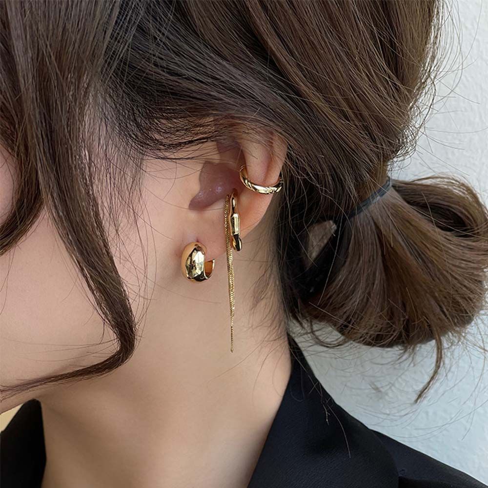 Set 4 Khuyên Tai Dạng Vòng / Khuyên Tai Bằng Kim Loại Phối Tua Rua Phong Cách Punk Thời Trang Hàn Quốc Cho Nữ