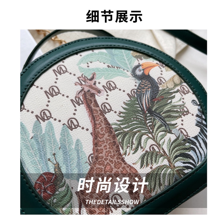 Túi đeo chéo JASMIN NOIR 22BL07166 hình tròn in họa tiết động vật phối dây xích thời trang cho nữ