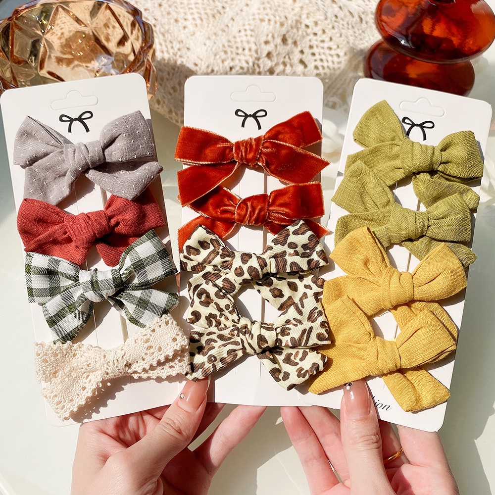 Set 4 Kẹp tóc KIDSBOWS nơ họa tiết da báo xinh xắn thời trang dành cho nữ