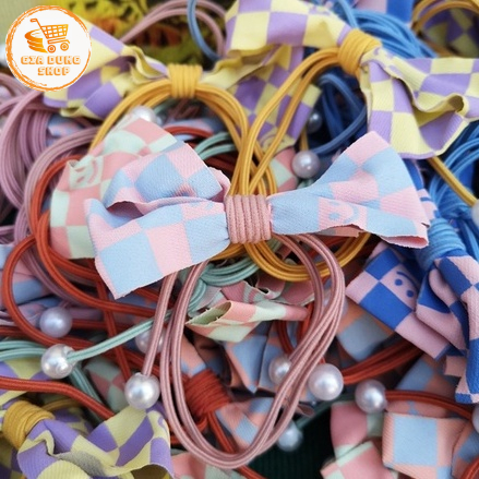 Dây cột tóc có nơ vải thanh lịch