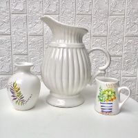 Bình sữa trắng cắm hoa