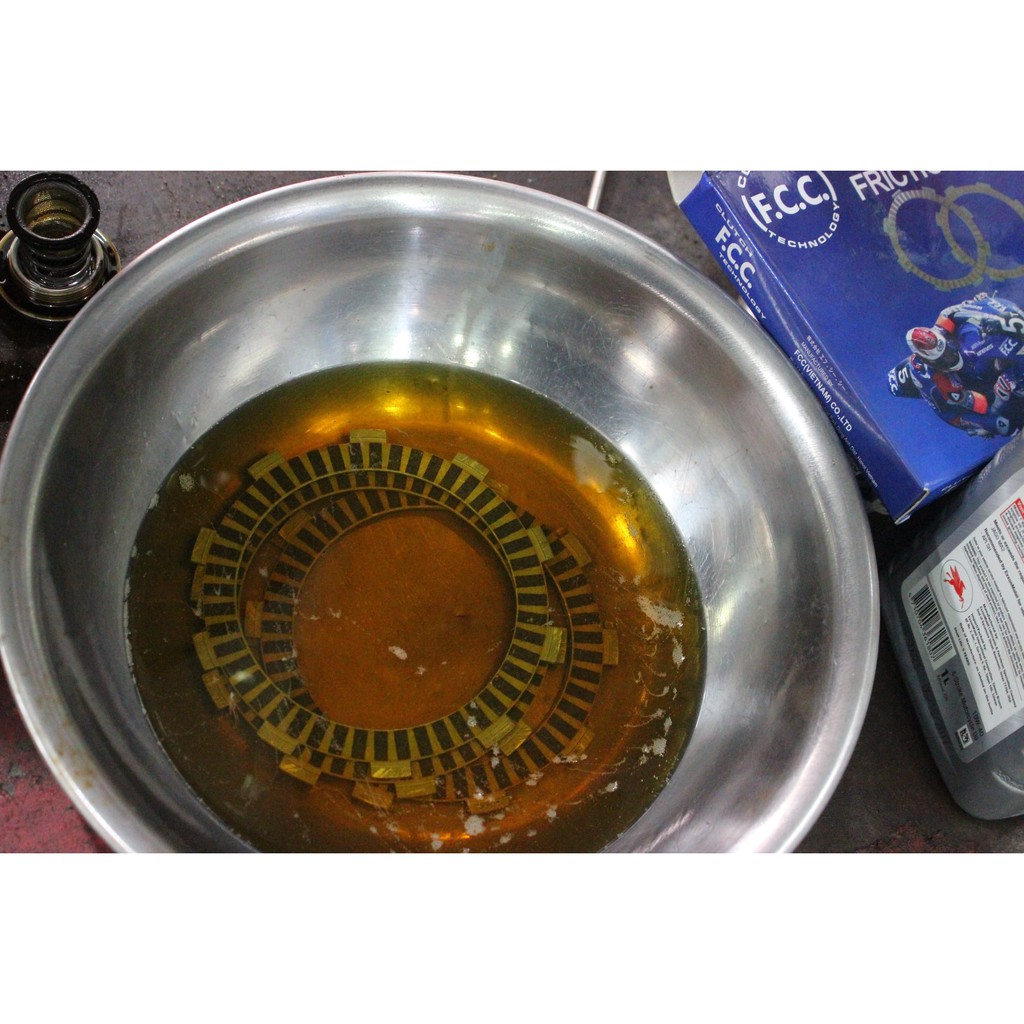 A5  bộ Lá bố nồi và Lá sắt FCC Yamaha Exciter 2009 - 2010 Xe 4 Xe Số col tự động