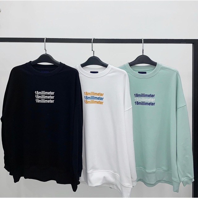 Sweater 3 màu còn xanh mint và đen