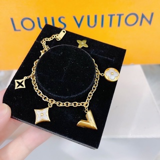 Lắc tay titan Lv mạ vàng