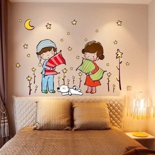 Decal dán tường bé ôm gối