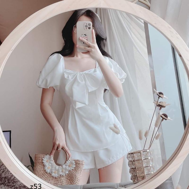 Set quần ngắn + áo tay phồng đính nơ