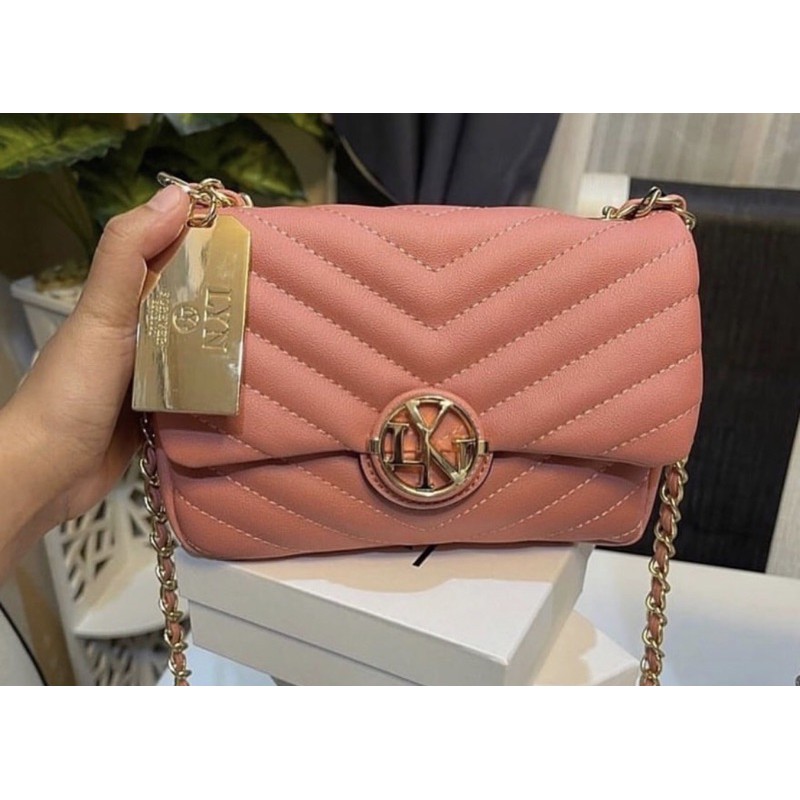 Túi lyn đeo chéo khoá tròn