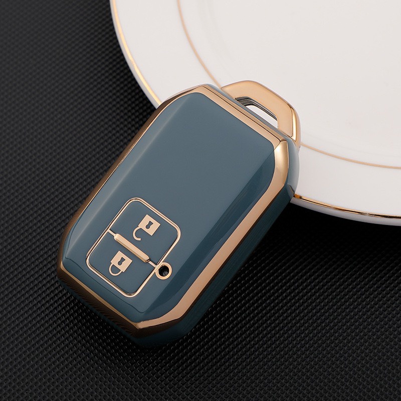 Móc khóa kèm ốp bảo vệ chìa khóa xe Suzuki XL7 nhựa mềm TPU tráng gương.