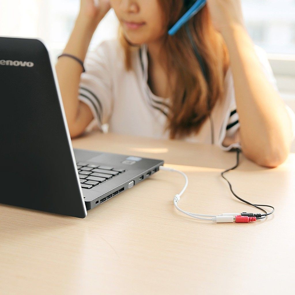 Dây chuyển đổi 3.5mm đực sang hai đầu 3.5mm (1 đầu hỗ trợ MIC, 1 đầu hỗ trợ âm thanh) dài 20CM UGREEN AV141 10789