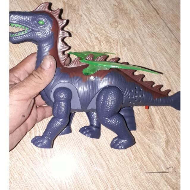 Chú khủng long chạy pin có nhạc và đèn led rất đẹp tặng kèm pin