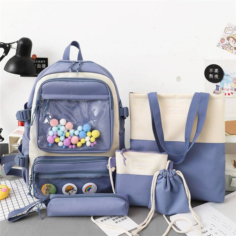 Ang apat na piraso ng junior high schoolbag ng babae na malaking kapasidad na simpleng istilo ng akademikong departamento ng gubat sa mga batang mag-aaral na nylon backpack