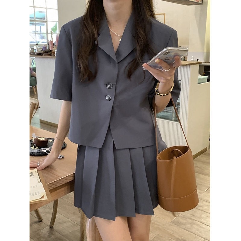 Set Áo Khoác Ngắn Tay Form Rộng + Chân Váy Xếp Ly Thời Trang Nữ