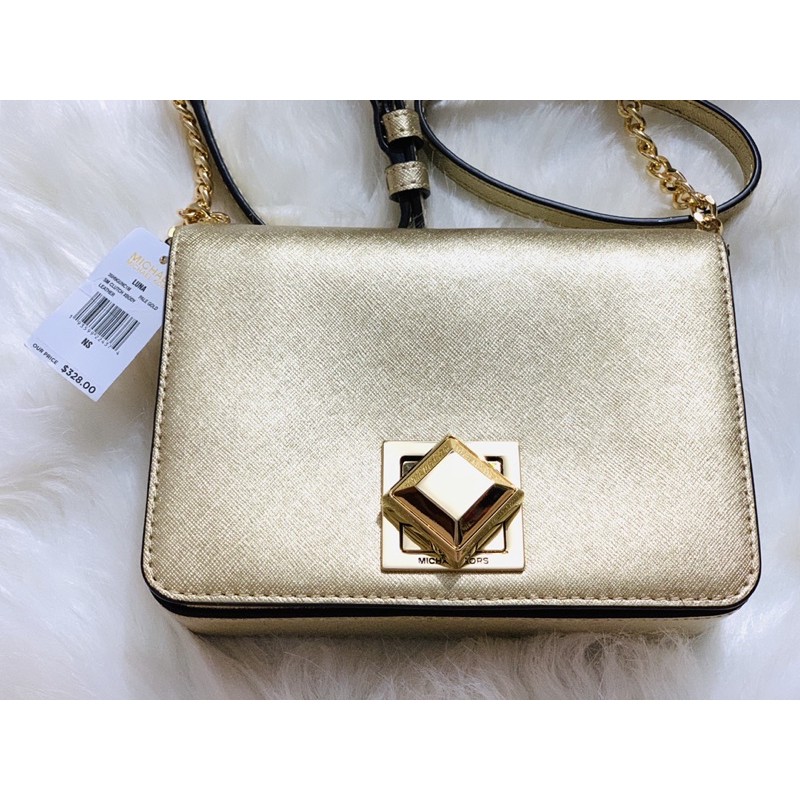 Túi đeo chéo Michael Kors SM Clutch Xbody Leather Pale Gold