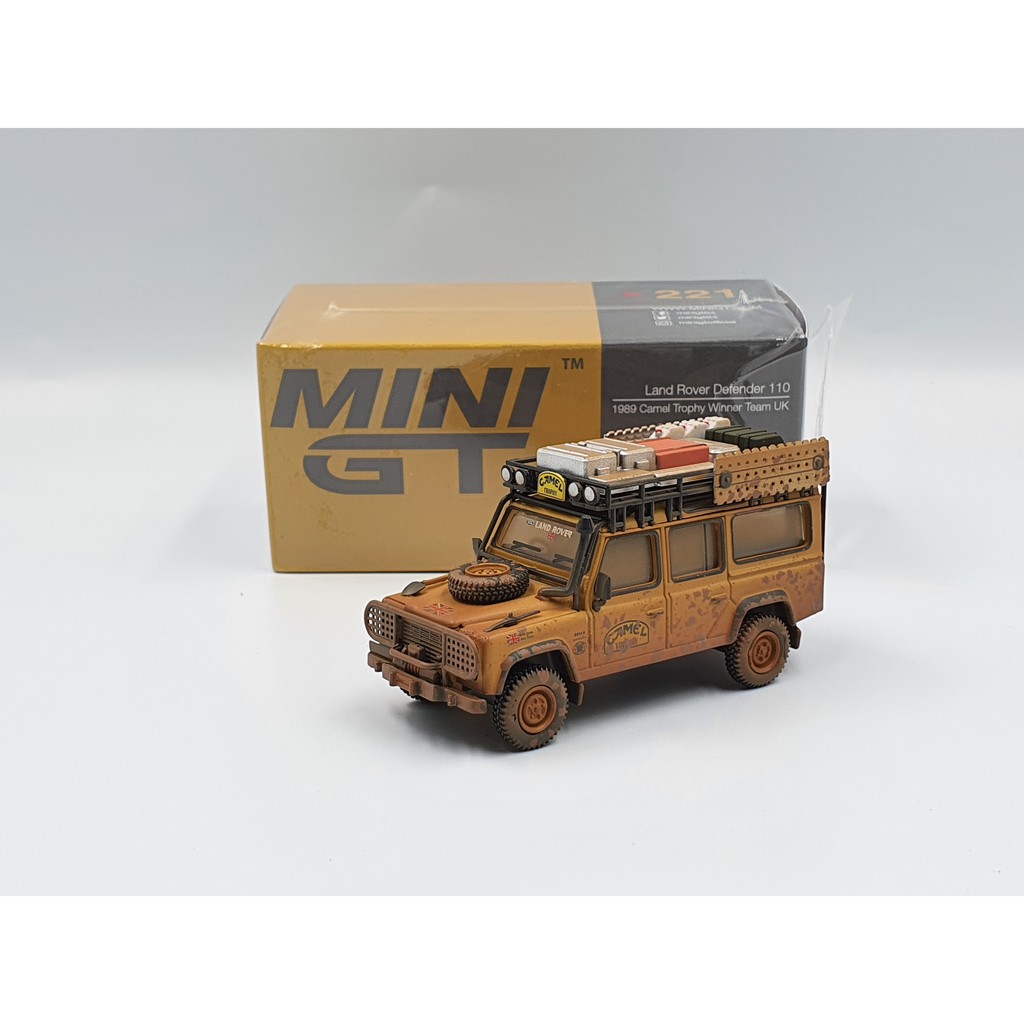 Xe Mô Hình Land Rover Defender 110 1989 Camel Trophy Winner Team UK RHD Tỉ lệ 1:64 Hãng sản xuất MiniGT ( Vàng Bụi )