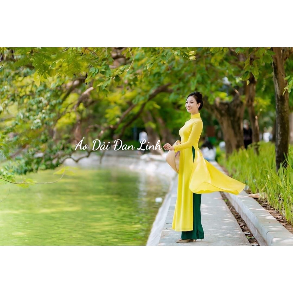 Áo dài trơn 4 tà màu vàng tôn da trẻ trung - Áo Dài Đan Linh