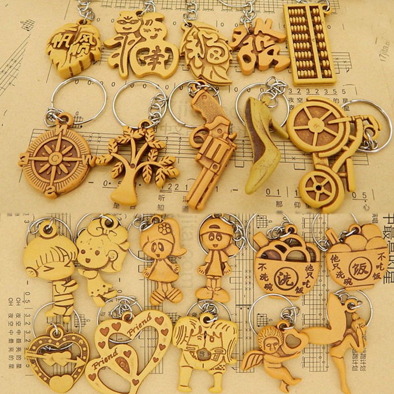 [QUÀ TẶNG] MÓC KHÓA GIẢ GỖ ĐIÊU KHẮC 3D (Mẫu Ngẫu Nhiên)