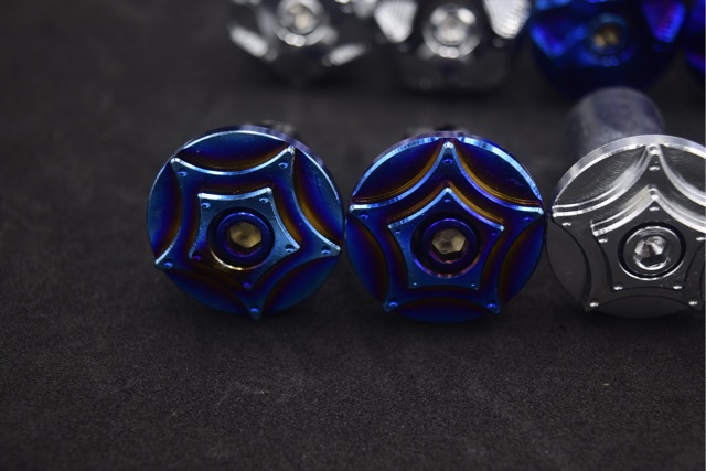 Gù tay lái ngôi sao CNC INOX titan