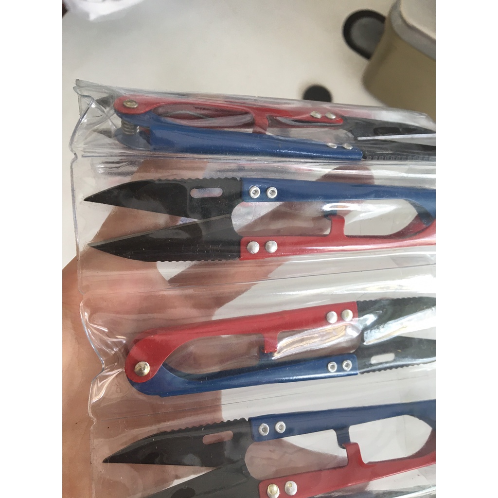 Kéo bấm chỉ răng cưa