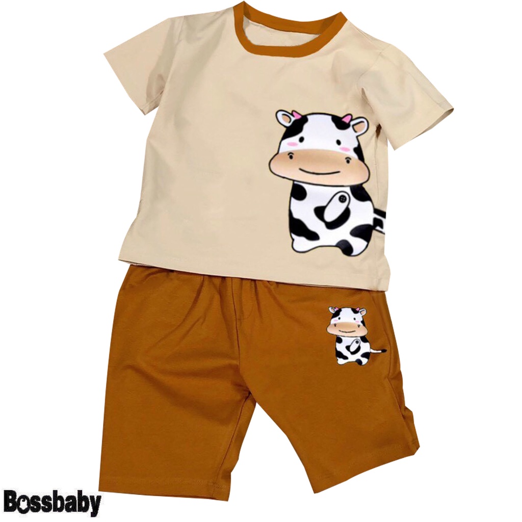 Bộ đồ bé trai hinh in bò sữa siêu dễ thuong cho bé từ 6kg đến 29kg.BDBT40.