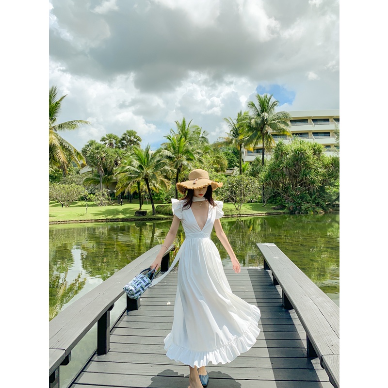 Đầm maxi trắng xẻ đùi cổ chử V hở lưng lai bèo HDC49 Hỉn Hỉn Store