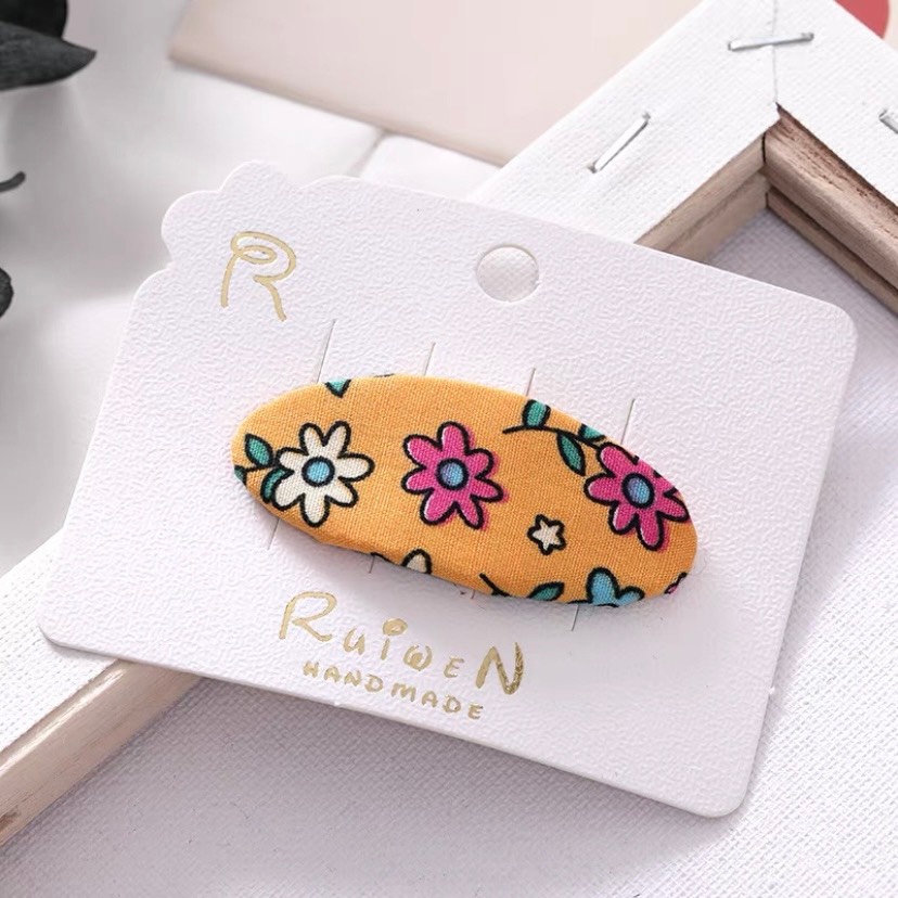 Kẹp tóc bầu dục họa tiết nhiều màu cho bé