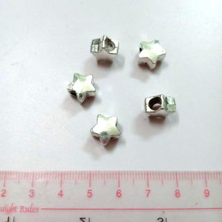 5 mặt sao xỏ ngang xi bạc