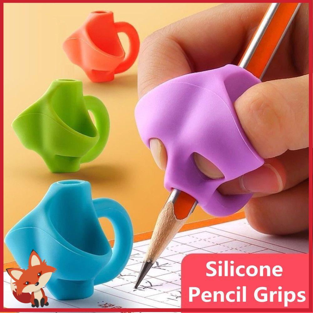 Dụng Cụ Kẹp Cầm Bút Định Hình Tư Thế Cầm Bút Bằng Silicon Màu Ngẫu Nhiên Cho Người Lớn Và Trẻ Em Giá Đỡ