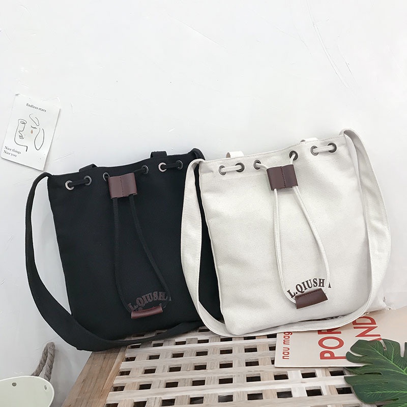 Túi Đeo Vai Vải Canvas Dây Rút Sức Chứa Lớn Mẫu Mới Dễ Phối Đồ Cho Nữ Sinh