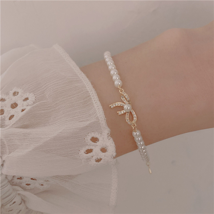 Vòng Tay Đính Đá Zircon Ngọc Trai Hình Nơ Xinh Xắn Cho Nữ