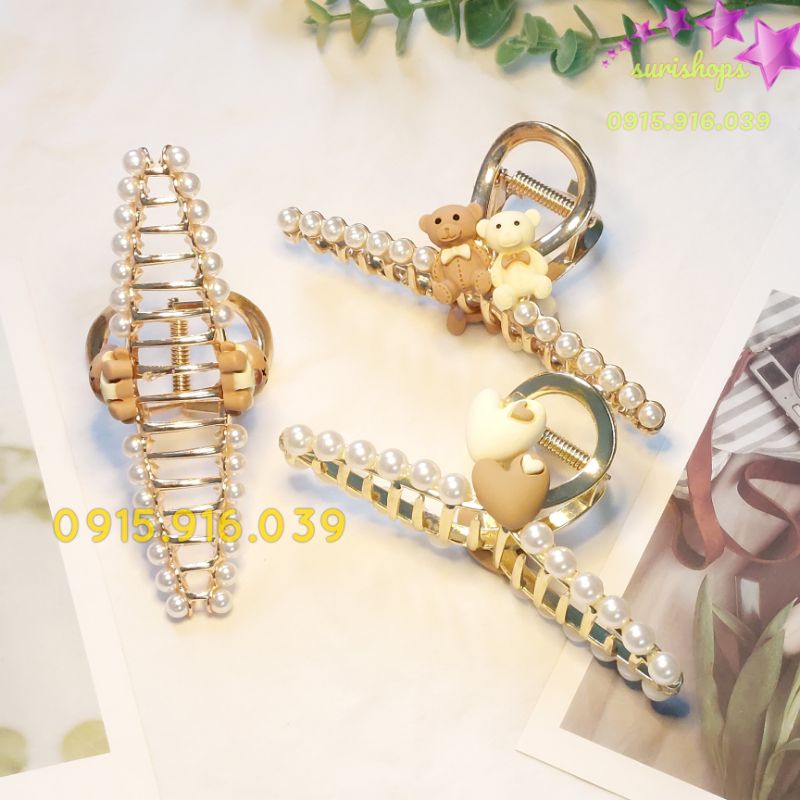 Kẹp tóc dạng T chéo kim loại màu vàng