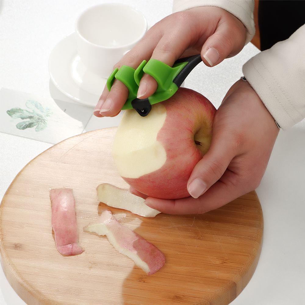 Dụng cụ gọt vỏ rau củ , trái cây kẹp 2 ngón tay