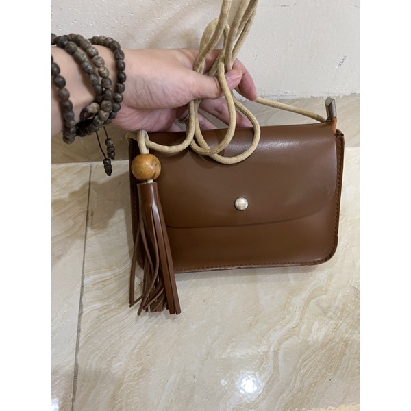 Túi si lạ màu nâu