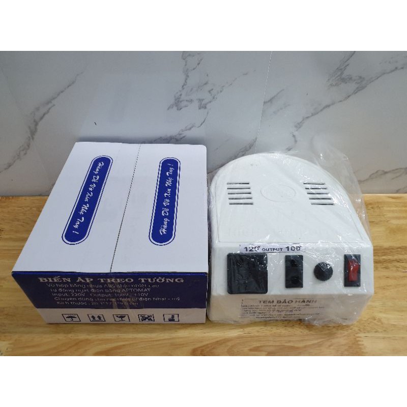 Biến áp treo tường 1KVA của DNT nhựa trắng. Input  220V- Output 120V-100V