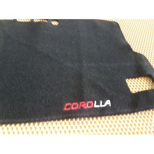 Thảm taplo nỉ xe Toyota Corolla