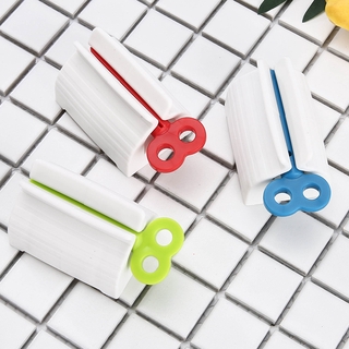 Rolling Tube Toothpaste Squeezer Toothpaste Seat Holder Stand Rotate Toothpaste Dispenser for Bathroom