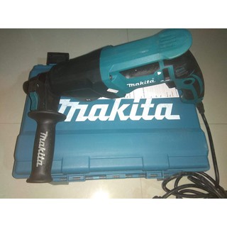 Máy khoan bê tông Makita HR2610 Madein TháiLan,  1000W đủ 3 chức năng khoan sắt, gỗ, khoan bê tông và đục bê tông.