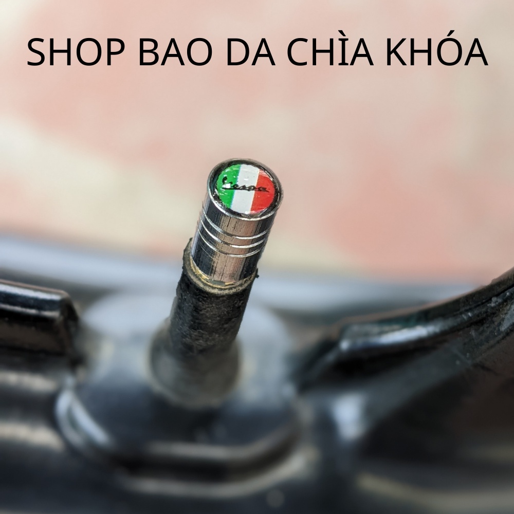 Nắp van xe máy vespa chất liệu kim loại có logo vespa