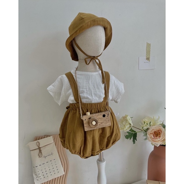 Set yếm + nón nâu muslin em bé Nanci room