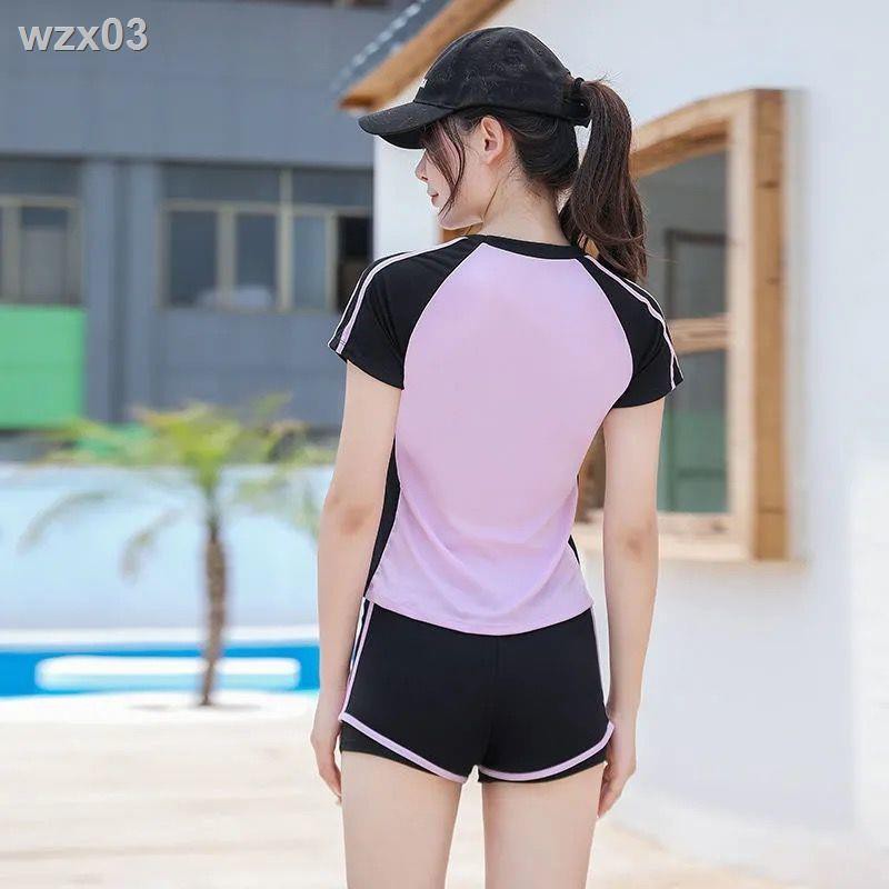 Áo tắm nữ hai mảnh xẻ tà bảo thủ thể thao giảm béo bụng 2021 tân sinh viên cộng với đồ bơi cỡ lớn