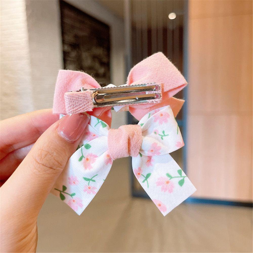Bộ 2 Kẹp Tóc Nơ Họa Tiết Hoa Xinh Xắn Cho Bé Gái