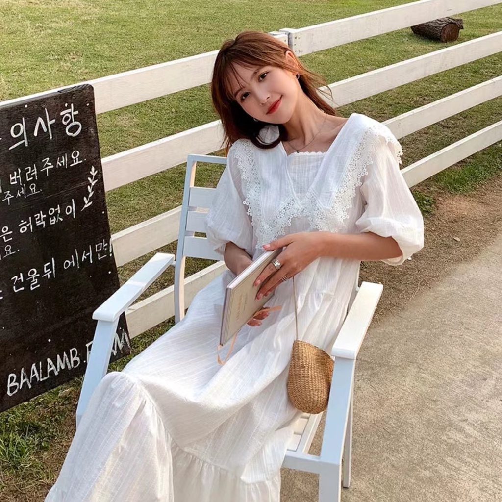 Đầm dáng rộng màu trắng dài hơn đầu gối thời trang cho nữ