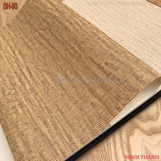 giấy dán tường mầu vàng nâu vân sần lượn sóng,có kim tuyến ,giấy lụa không keo ,khổ 53cm,dán phòng khách ,phòng ngủ