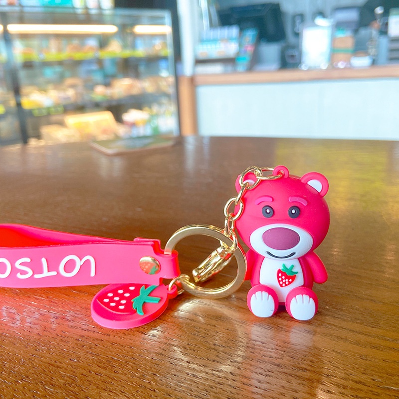 Móc Chìa Khóa Bằng PVC Hình Gấu Và Quả Dâu Dễ Thương