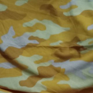 Cotton rằn ri vàng phối vàng đất chất thun 2 chiều