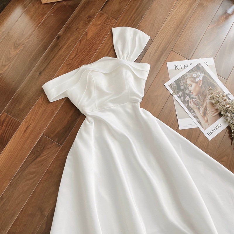 Đầm dự tiệc trắng lệch vai nơ audikt | BigBuy360 - bigbuy360.vn